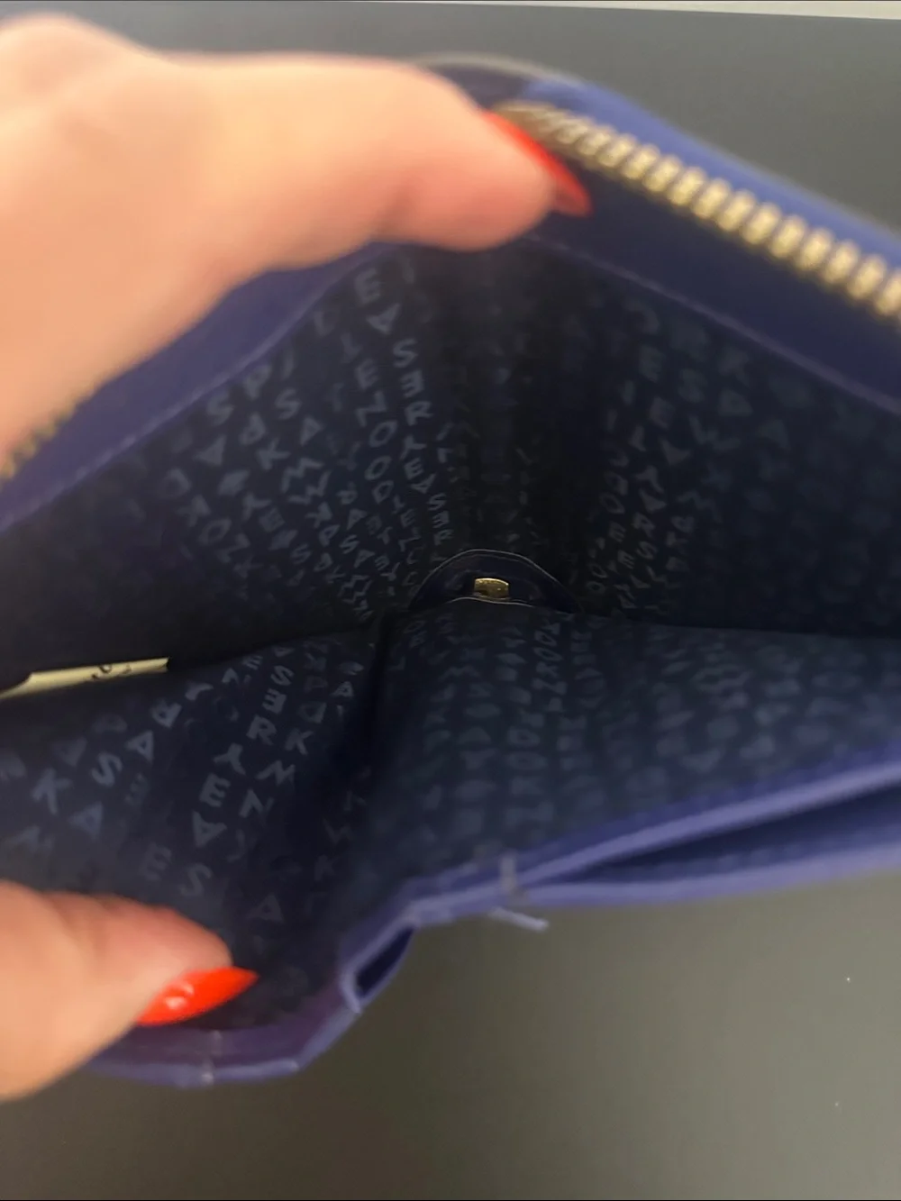 EUC kate spade cobalt blue laser-cut zip wallet with gold logo and Gold Zipper